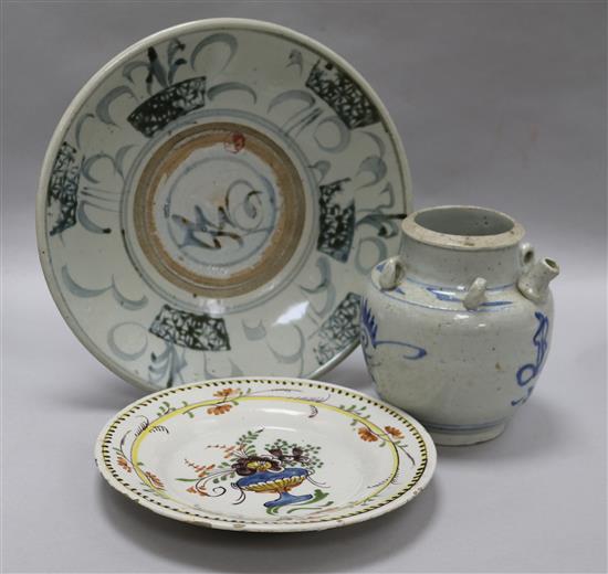 A Chinese blue and white kendi, a blue and white plate and a faience plate